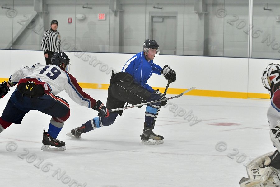 Wheaton College Men\'s Ice Hockey vs Middlesex Community College. - Photo By: KEITH NORDSTROM